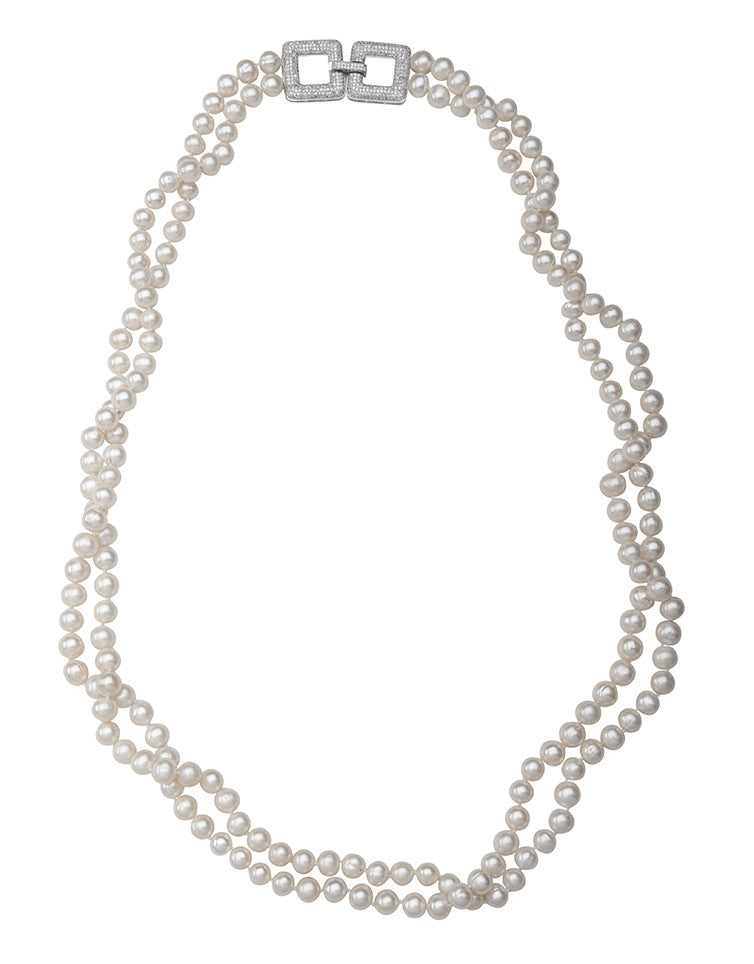 Double strand pearl necklace with crystal clasp