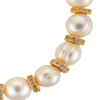 Pearl and round gold disc bracelet