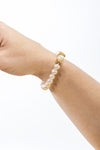 Statement pearl and gold square bracelet with large center stone