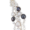 Four-strand white pearl necklace with black accents