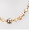 18” Freshwater Pearl 8-9mm with 11mm pink Biwa pearl and gold bead accents