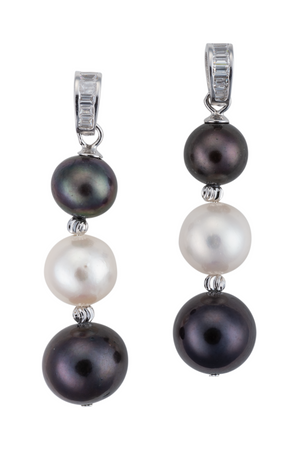 An image of black and white three pearl earrings, with crystal accents.