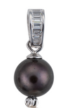 A close-up image of a freshwater cultured black pearl, part of black and white three pearl earrings, with crystal accents.