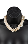 An image of a five-strand white cultured keshi pearl necklace with a magnetic clasp on a black mannequin