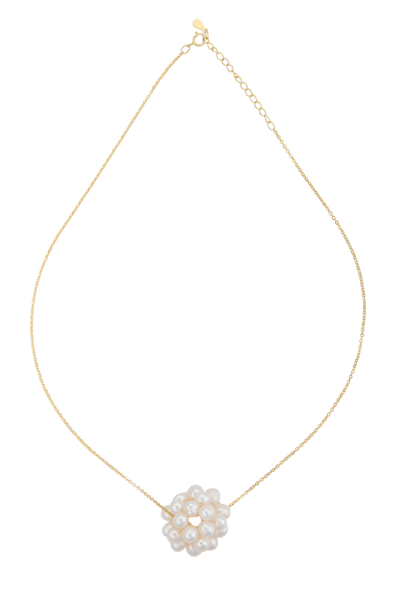 An image of a white snowball pearl cluster necklace on a gold chain